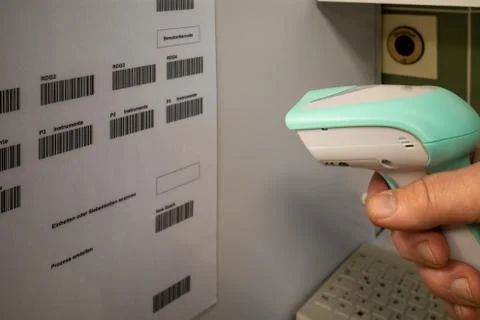 In a sterilization department a barcode is read with a scanner Stock Photos