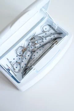 Sterilization of manicure tools in a sterilizer Stock Photos