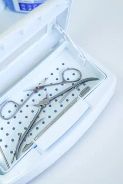 Sterilization of manicure tools in a sterilizer Stock Photos