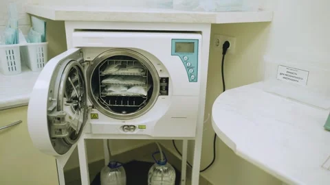 Sterilization process for dental instruments in a modern clinic setting Stock Footage 331931023