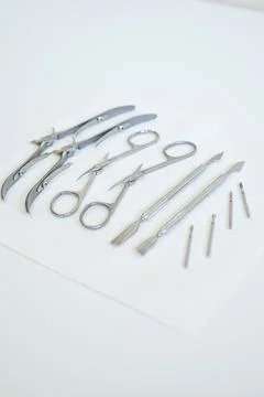 Sterilized Manicure Tools on a White Surface Stock Photos