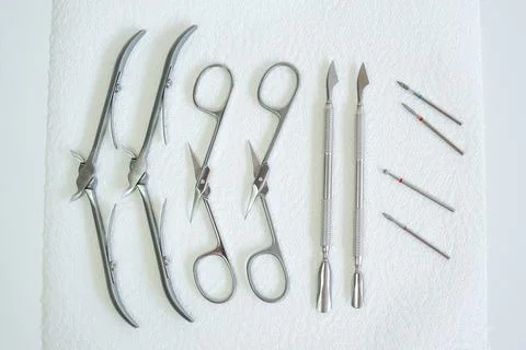 Sterilized Manicure Tools on a White Surface Stock Photos