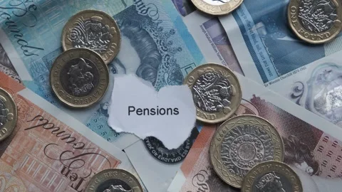 Sterling bank notes and pound coins cash. With Pensions Stock Footage 263822189