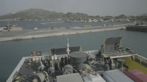 The stern of a ferry pulling out of Zakynthos Harbour in Greece Stock Footage 238844283