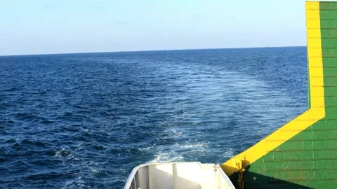 Stern roro ferry and Ship foam line on a blue sea in a blue day. Stock Footage 280953935