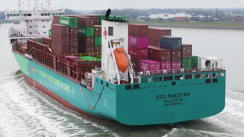 Stern section eco maestro container ship stacked evergreen multicolored cargo Stock Footage 328204648