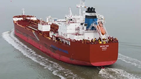 Stern section red tanker bayou sun white superstructure blue and black funnel Stock Footage 328204979