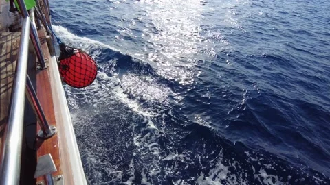 Stern of the ship at sea. the view of the ship cutting the sea waves Stock Footage 162487768