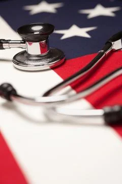 Stethoscope on American Flag with Selective Focus. Stock Photos