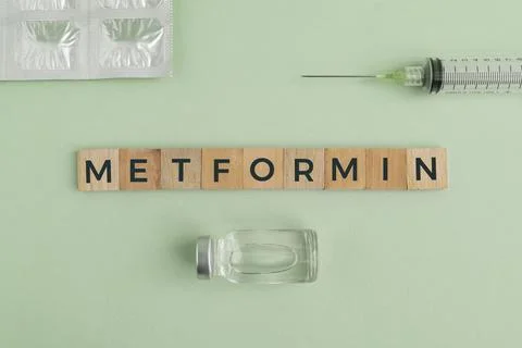 Stethoscope and alphabet letters with the word Metformin. medical and healt.. Stock Photos