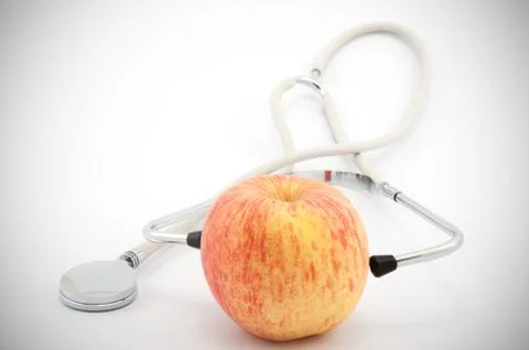 Stethoscope and apple Stock Photos