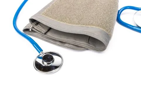 Stethoscope and an automatic cardio pressiometer on a white background Stock Photos
