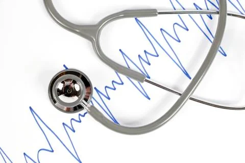Stethoscope and blue graph. Stock Photos