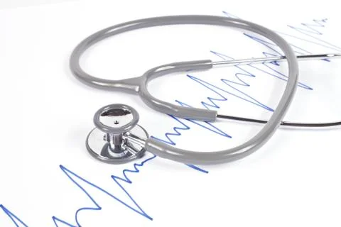 Stethoscope and blue graph. Stock Photos