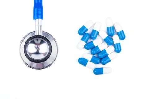 Stethoscope and capsule Stock Photos
