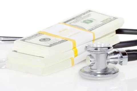 Stethoscope and dollars Stock Photos
