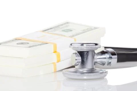 Stethoscope and dollars Stock Photos