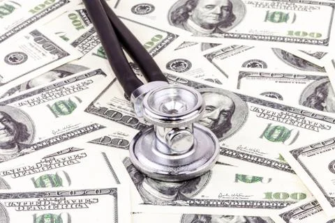 Stethoscope and dollars Stock Photos