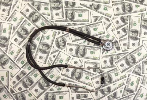 Stethoscope and dollars Stock Photos
