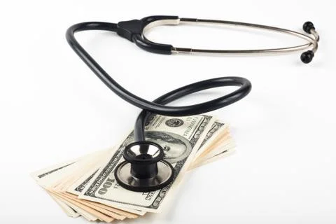 Stethoscope and dollars Stock Photos