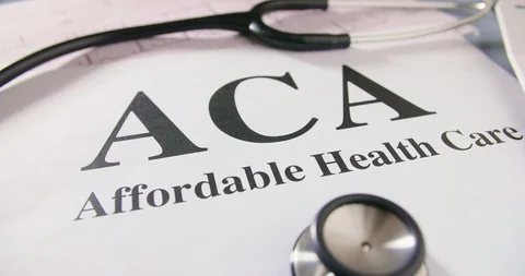 Stethoscope And ECG Report With ACA Text On Paper Stock Footage 92365681