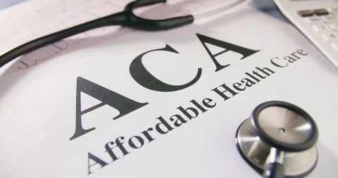 Stethoscope And ECG Report With ACA Text On Document Stock Footage 92365702