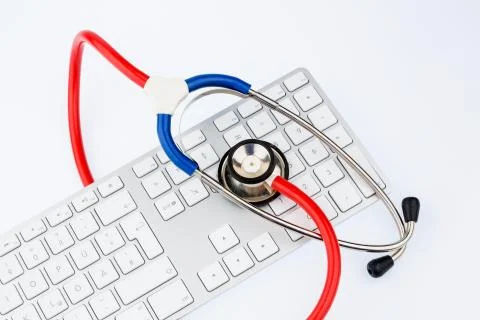 Stethoscope and keyboard of a computer Stock-Fotos