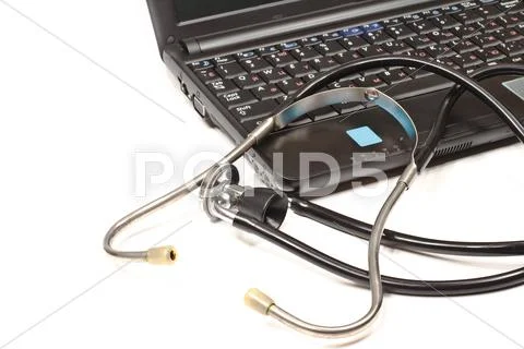 Stethoscope and laptop Stock Photos