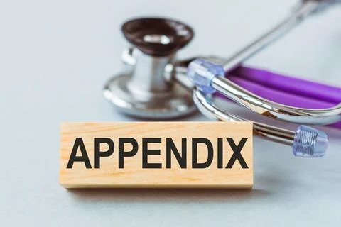 Stethoscope with APPENDIX words on wooden cube. Stock Photos