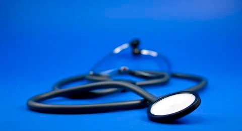Stethoscope on blue background Stock Photos