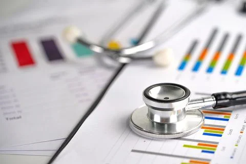 Stethoscope on chart or graph paper, Financial, account, statistics and busin Stock Photos