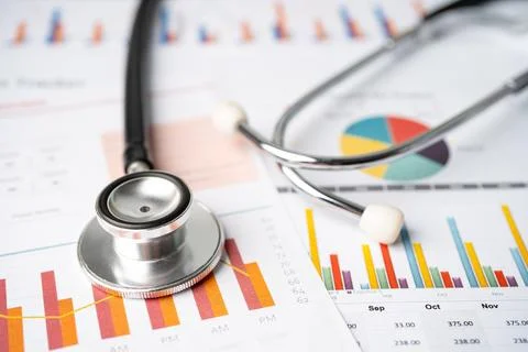 Stethoscope on charts and graphs spreadsheet paper, Finance, Account, Stati.. Stock Photos