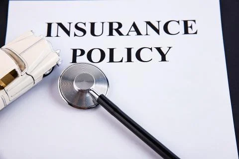 Stethoscope checking up the car on a white background. Concept of car check u Stock Photos