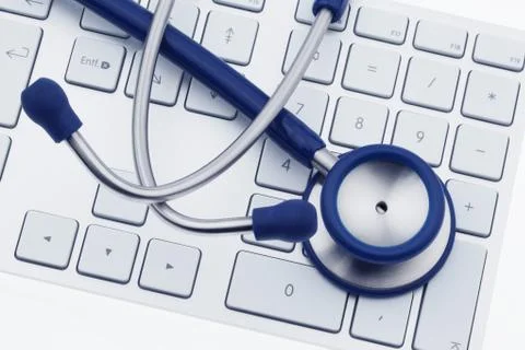 Stethoscope on computer keyboard Stock-Fotos
