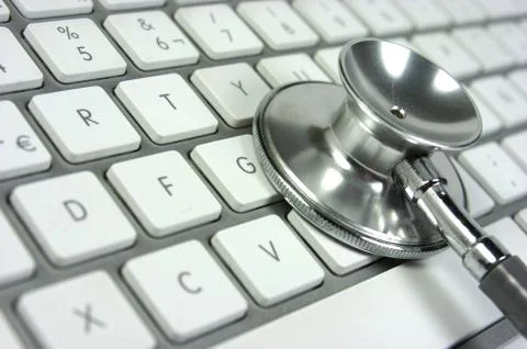 Stethoscope, computer keyboard  Stock Photos