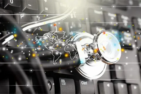 Stethoscope on a Computer Keyboard Stock Photos