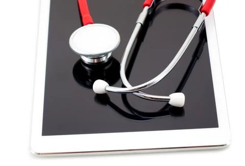 Stethoscope on with computer tablet ,technology healthcare concept Stock Photos