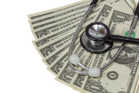 Stethoscope on dollar notes Stock Photos