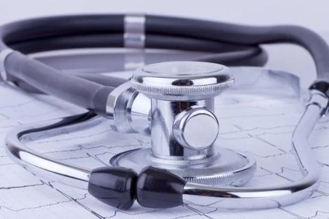 Stethoscope on ecg Stock Photos