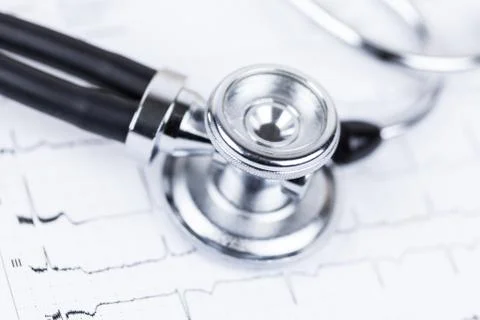 Stethoscope on ecg Stock Photos