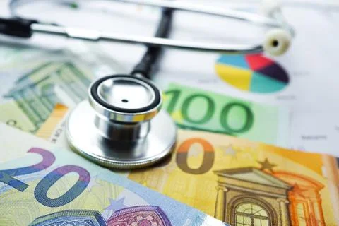 Stethoscope on Euro dollar banknotes. Stock Photos