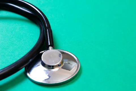 Stethoscope on green background Stock Photos