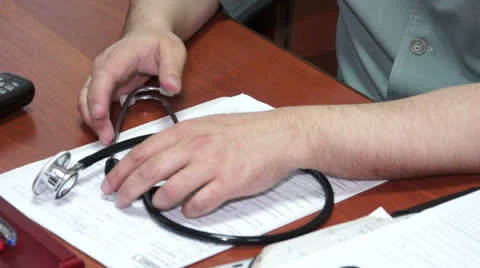 Stethoscope at the hands of the doctor Video stock 24818827