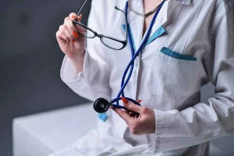 A stethoscope in the hands Stock Photos