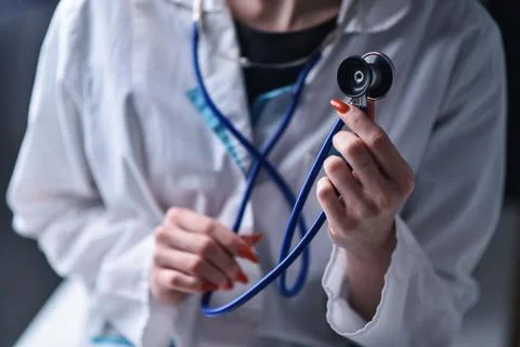 A stethoscope in the hands Stock Photos