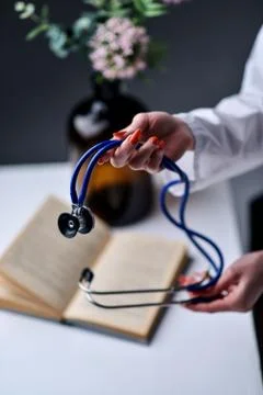 A stethoscope in the hands Stock Photos