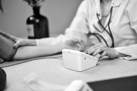 A stethoscope in the hands Stock Photos