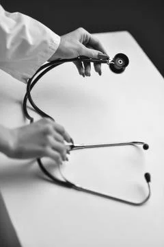 A stethoscope in the hands Stock Photos