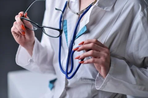 A stethoscope in the hands Stock Photos