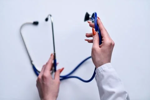 A stethoscope in the hands Stock Photos